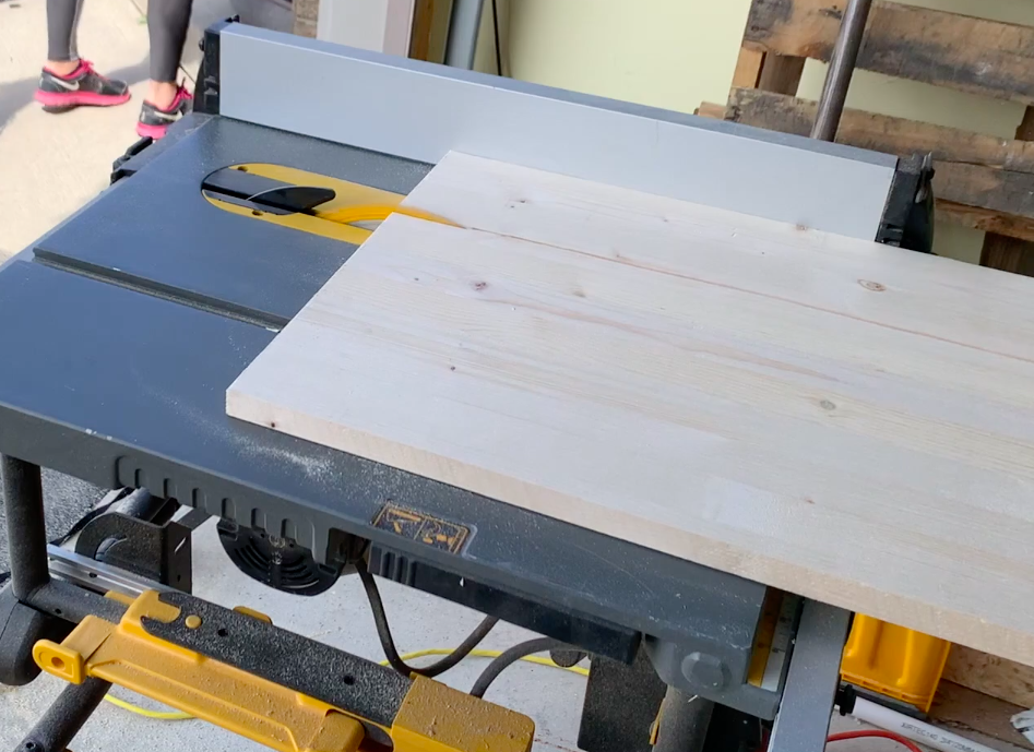 table saw cutting wood